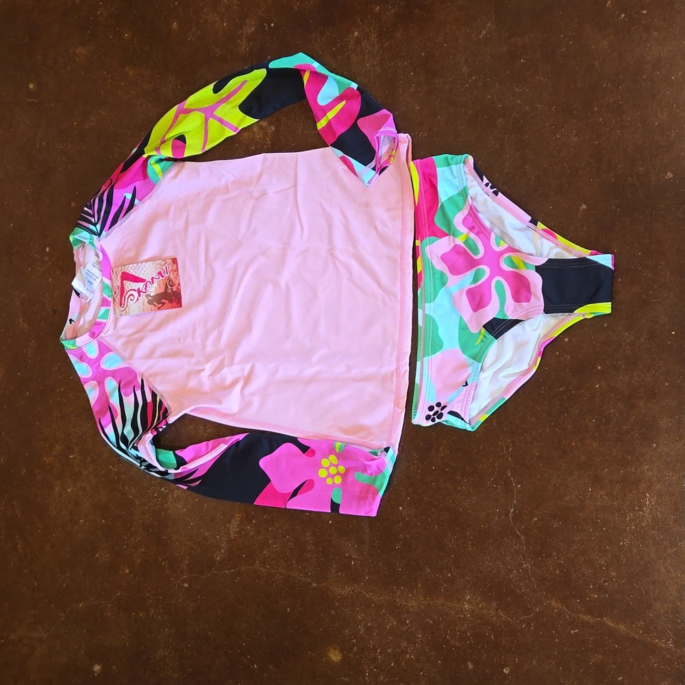 Girls kanu surf 2piece pink and multi color swimsuit Size 12. NWT